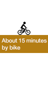 About 15 minutes by bike