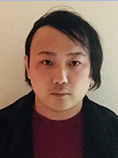 山西　良典